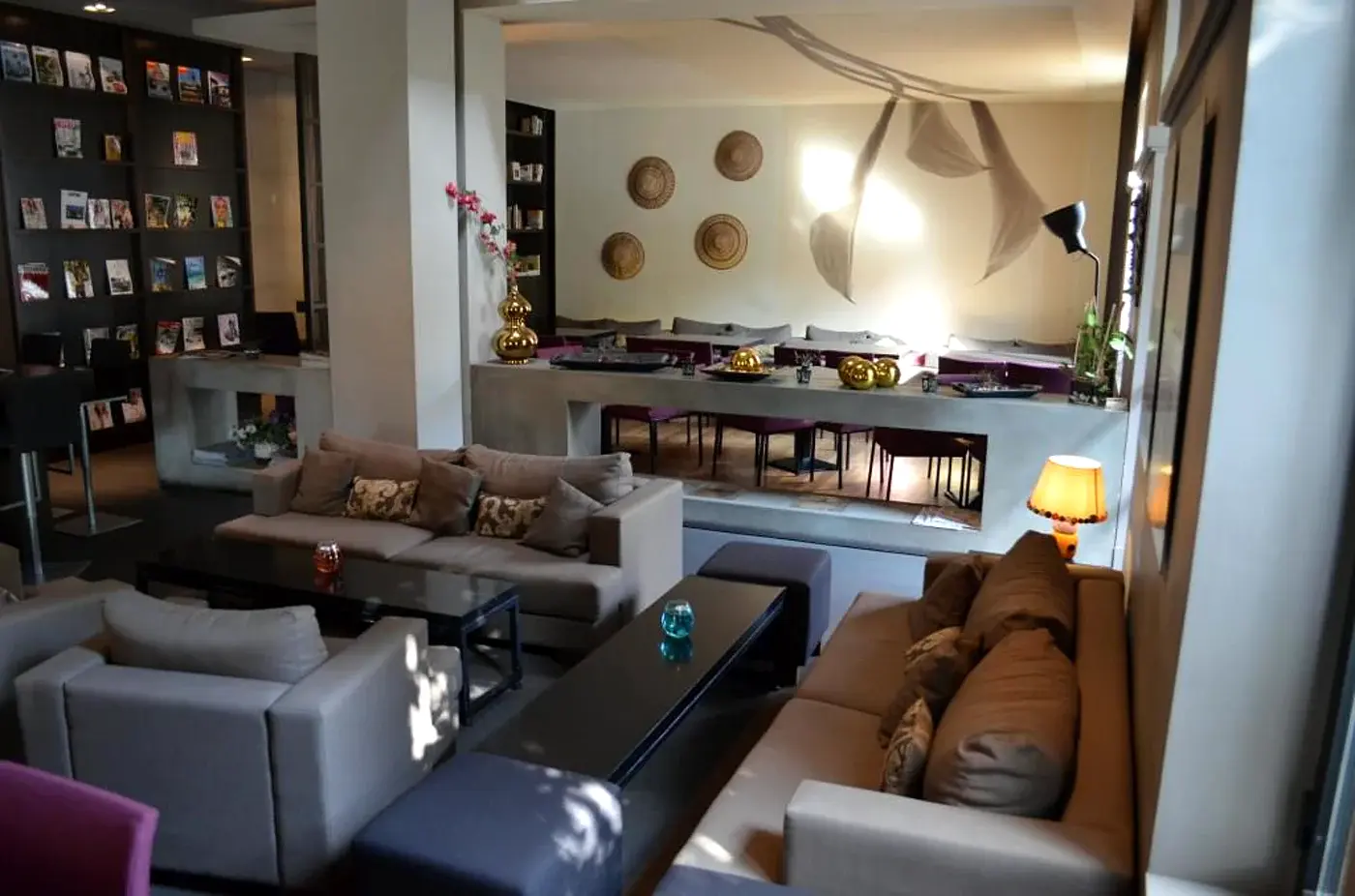 Nero Website hero section with real daytime lounge photography